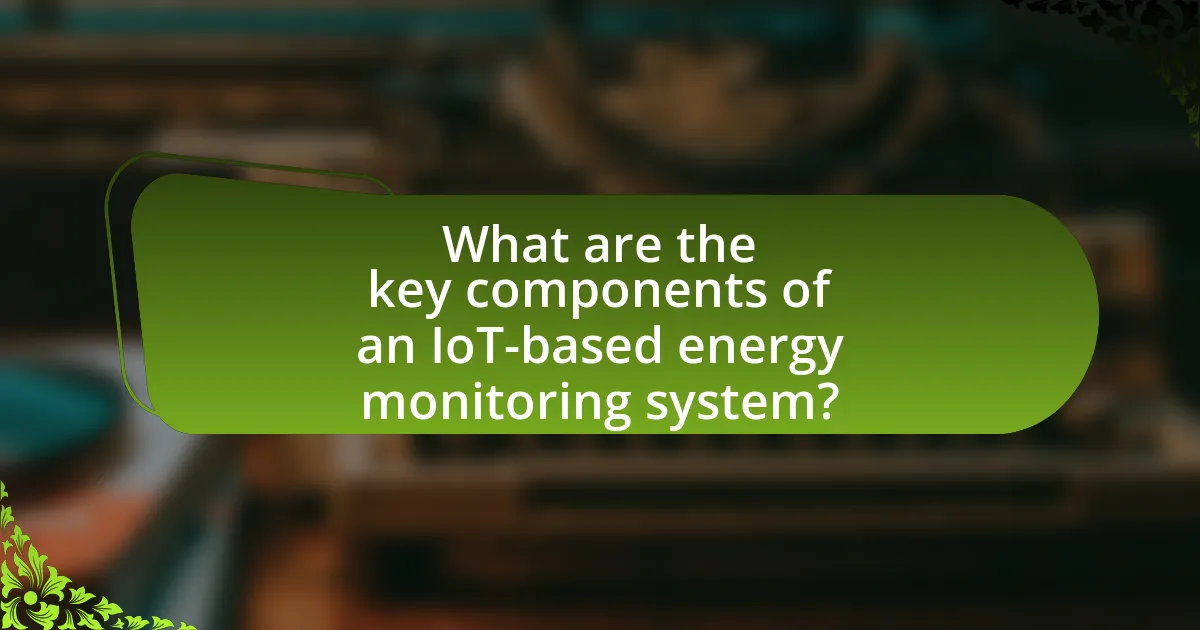 What are the key components of an IoT-based energy monitoring system?