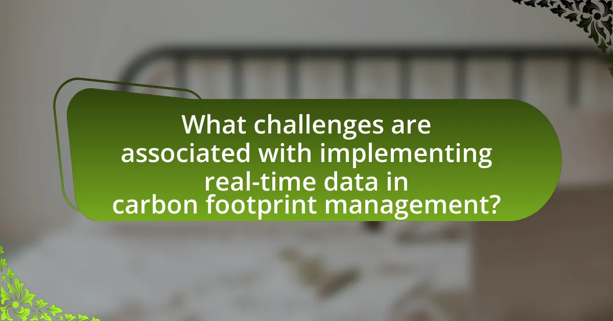 What challenges are associated with implementing real-time data in carbon footprint management?